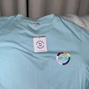 Together Forever Light Blue Graphic Tee made by PUMA